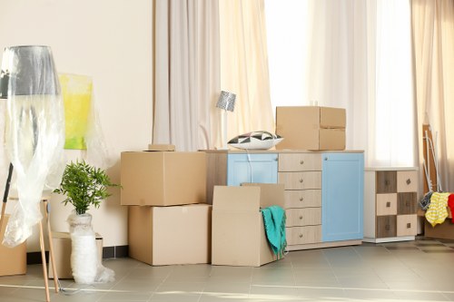 Moving team protecting belongings during a Parsonsgreen van service