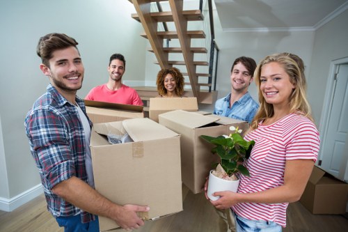 Packed furniture and boxes prepared for a Parsonsgreen removal