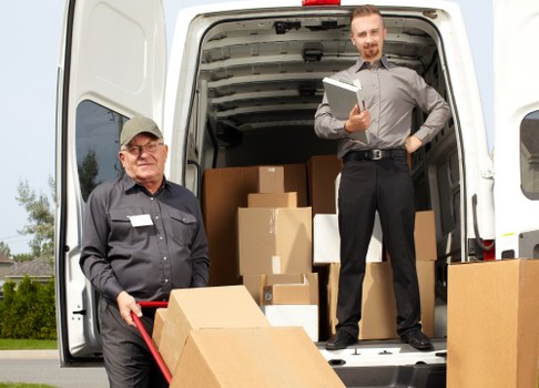Driver completing a pre-journey vehicle safety inspection