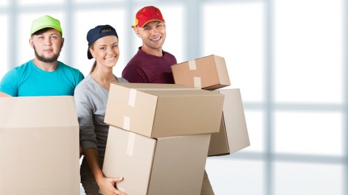Safe van loading process with PPE and careful handling