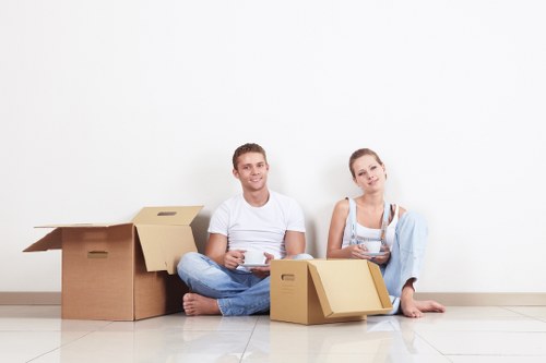 Organised storage space in Parsonsgreen with labeled boxes and furniture