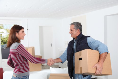 Neatly labeled boxes prepared for a smooth move in Parsonsgreen