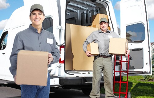 Packed office equipment ready for commercial moves in Parsonsgreen