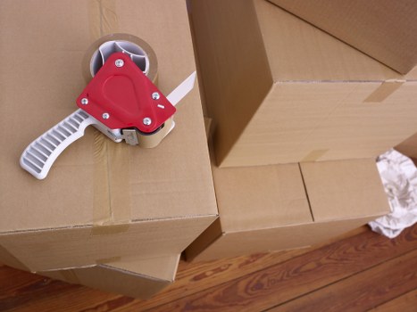 Furniture being carried through a Parsons Green property